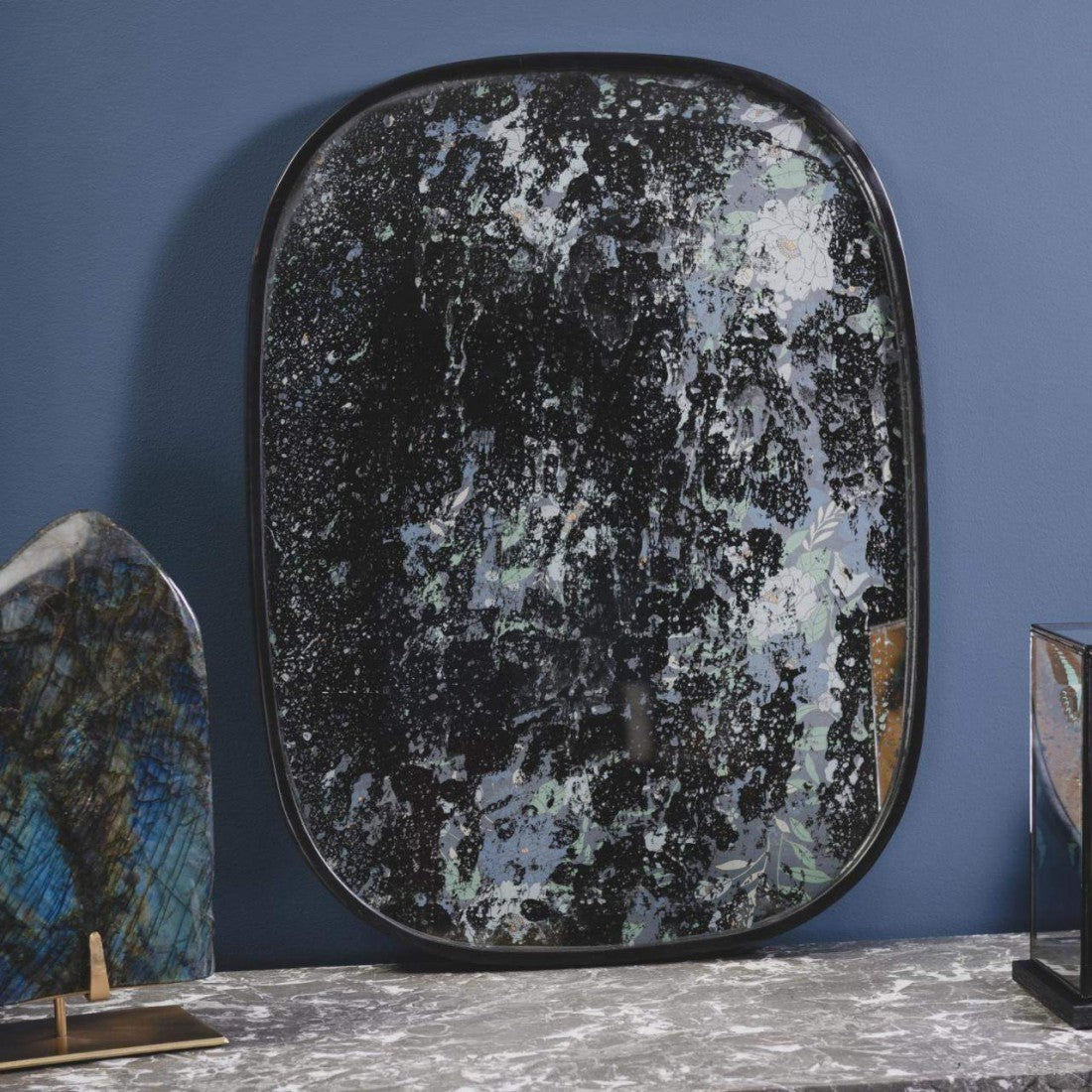Black Oval Semi Erased Mirror with Blue Textile Print